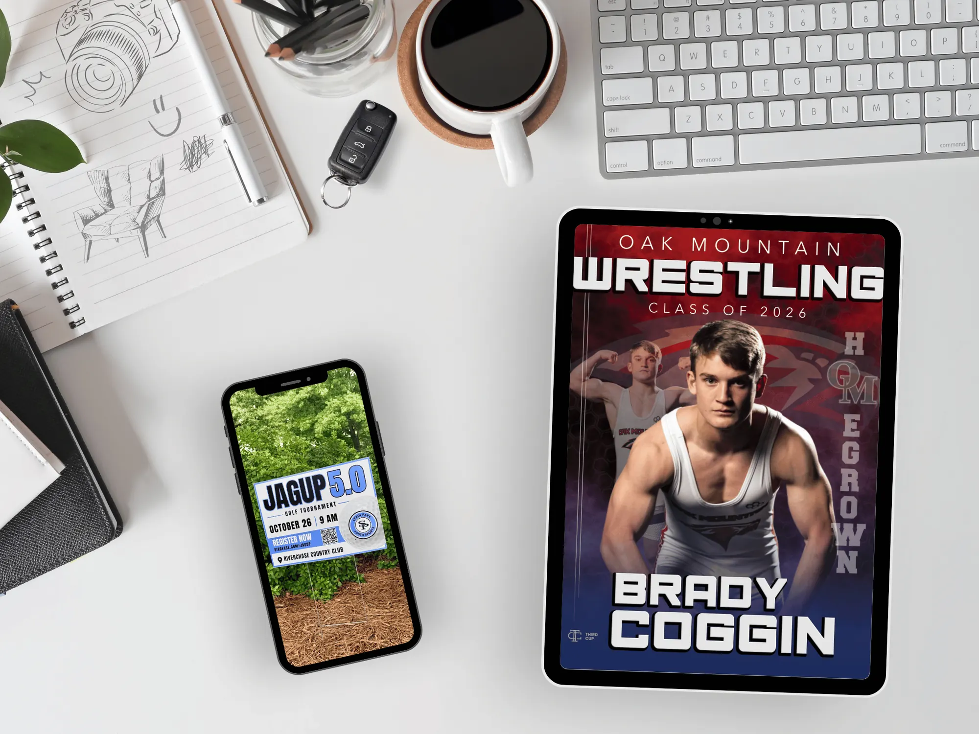 A tablet and phone on a styled desk showing Third Cup design work: a wrestling senior banner and an event yard sign